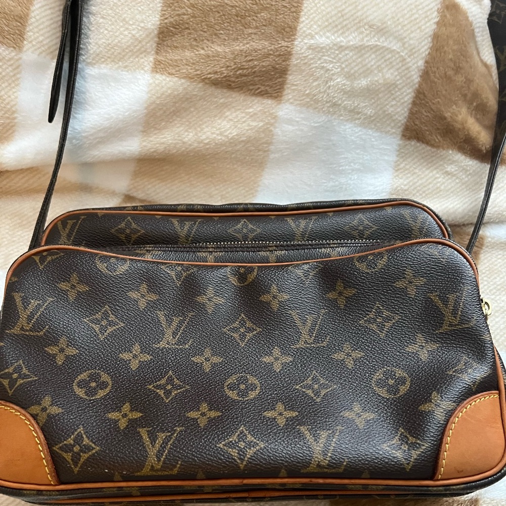 Authentic Louis Vuitton monogram Nile bag